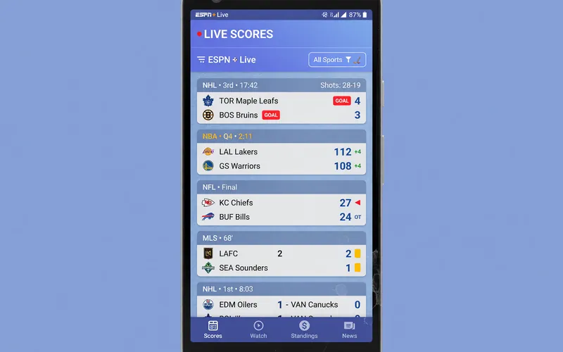 SportsAdda app screen showing live scores for cricket, football, kabaddi and tennis on the same cobalt-blue feed